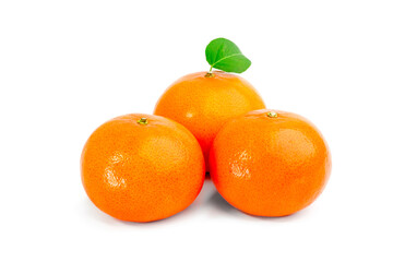 Three isolated tangerine on white background