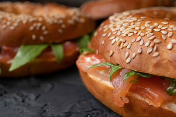 Bagels with salmon and arugula, healthy snack, proper nutrition