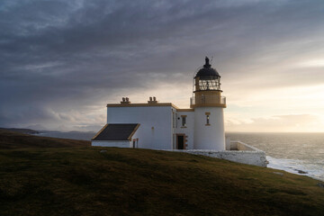 Fototapeta na wymiar Stoer Lighthouse in northern Scotland, on a beautiful sunset.