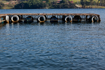 Wooden pier on the lake at daylight