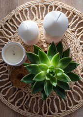 Coffee with sweets on the table, a vase with red roses and candles. Beautiful still life