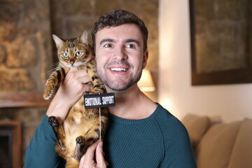 Man finding emotional support in cat