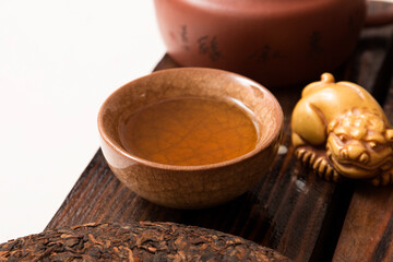 Tea ceremony, fresh tea. Traditional teapot and teacup.