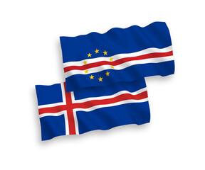 National vector fabric wave flags of Republic of Cabo Verde and Iceland isolated on white background. 1 to 2 proportion.