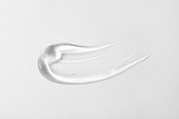 Sample of cosmetic gel on white background, top view