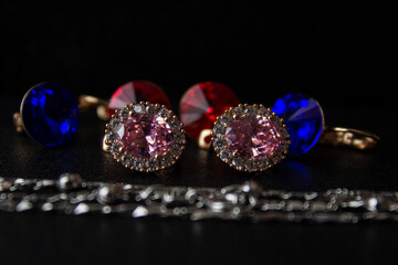 neck suspension with a large turquoise stone, onyx isolated on a black background