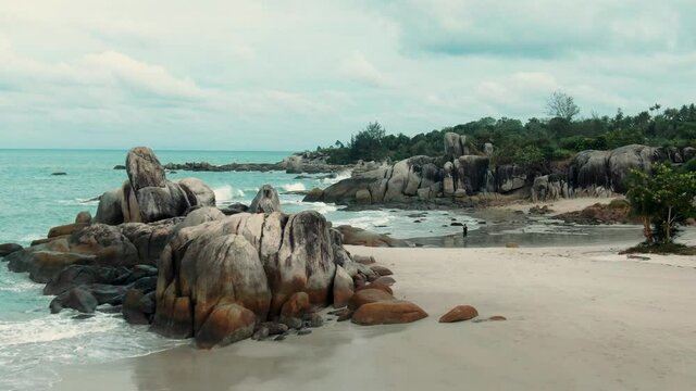 Rambak beach, one of the most beautiful beaches in Bangka Belitung, Indonesia | aerial drone footage videography 4k