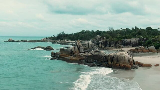 Rambak beach, one of the most beautiful beaches in Bangka Belitung, Indonesia | aerial drone footage videography 4k