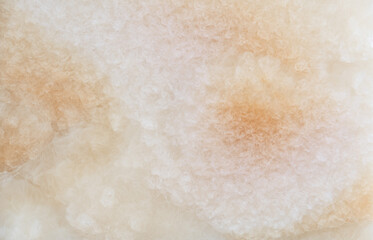 Rock abstract warm beige stone natural background.