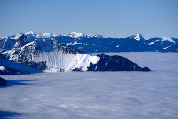 Panoramic view of mountains seen from mountain village Stoos, Canton Schwyz, on a sunny winter day. Photo taken December 20th, 2021, Stoos, Switzerland.