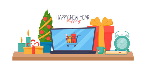 Online shopping. Laptop with a shopping basket on the screen, buying Christmas gifts. New Year's shopping from home in online stores. Gifts for loved ones.