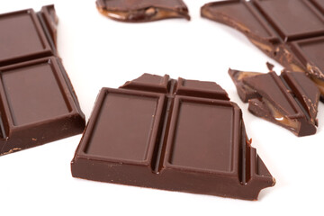 Dark chocolate bar and cubes with cream filling inside