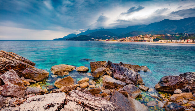 Incredible afternoon view of Potam Public beach. Dramatic spring seascape of Adriatic sea. Wonderful cityscape of Himare town, Albania, Europe. Traveling concept background.