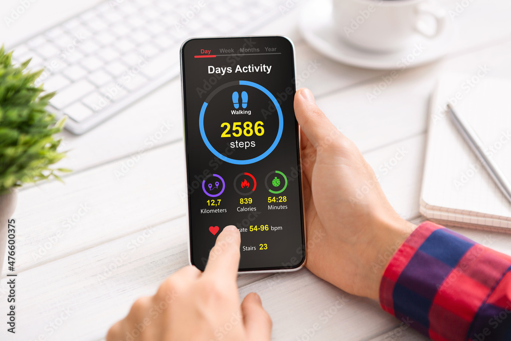 Poster unrecognizable man checking his heart rate while working