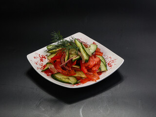 Vegetable salad with tomato and cucumbers