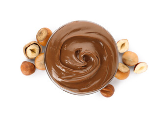Tasty chocolate hazelnut spread and nuts on white background, top view