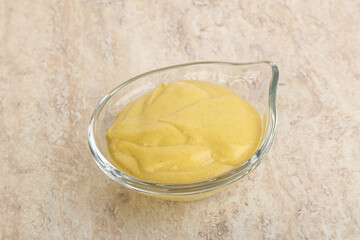 Organic mustard sauce in the bowl