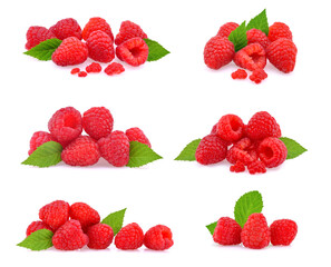 Raspberry with leaves isolated on white background