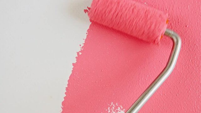 Abstract brushstrokes of pink paint brush applied isolated on a white background. Pink paint smear texture. Pink sparkling textured artistic illustration. Smears of cosmetics. High quality 4k footage