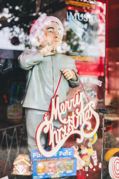 vintage Christmas sign with Santa Santa hat and Dr evil from Austin Powers 