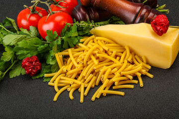Italian pasta raw Maccheroni for cooking