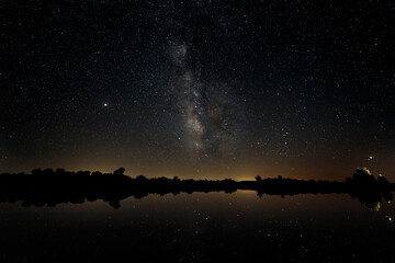 Night photography with Milky Way in Natural Area of Barruecos. Extremadura. Spain. - obrazy, fototapety, plakaty