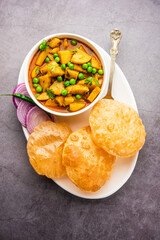 Poori Masala or potato curry with fried puri