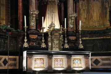 Altar Close Up with Tabernacle, Cross and Candlesticks at the Saint Nicholas Basilica in Amsterdam, Netherlands