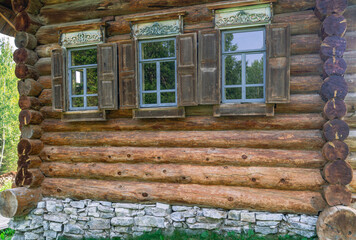 Wooden rural house made of huge logs. This house was built in the second half of the XIX century....