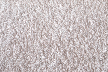 Soft Fur white carpet. wool sheep fleece closeup texture background