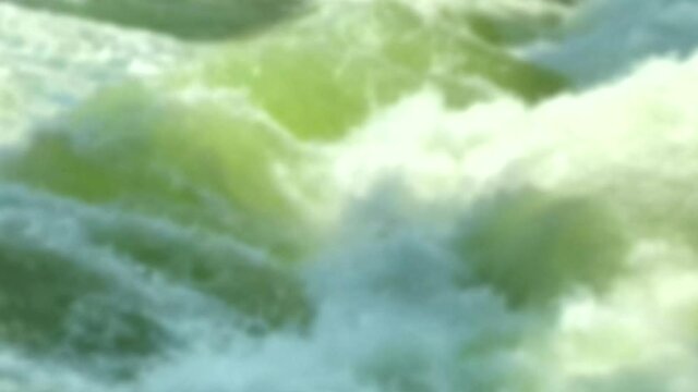 Standing wave on Eisbach in Munich the best place in the world for urban surfing