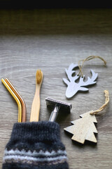 Christmas stocking filled with sustainable gifts and wooden decorations. Selective focus.