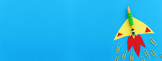 Back to school or education concept. rocket made from pencil over paper background