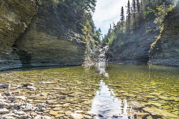 View on the Kalimazoo river and in the background the waterfall, on Anticosti Island, in Cote Nord...