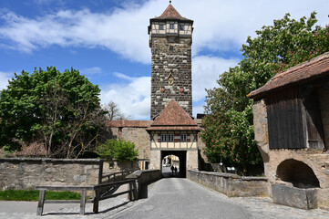 The gate Rödertor with its tower in the historical town of Rothenburg ob der Tauber in Bavaria,...