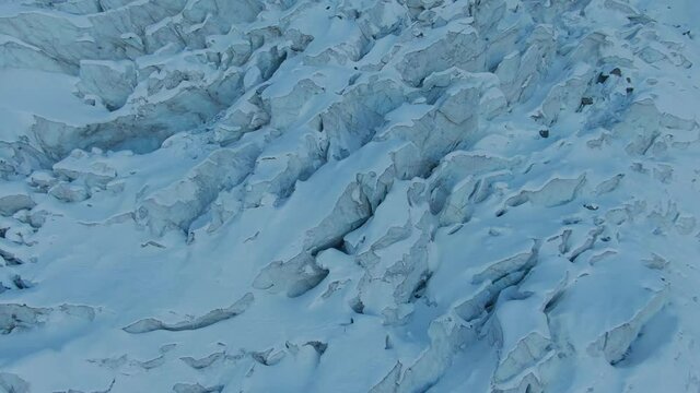 mountain or alpine glacier in mountainous region, long glacier system filling a mountain valley. melting mountain glaciers, massive ice sheets