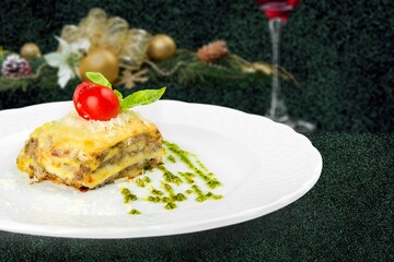 Christmas Fresh tasty hot lasagna. Traditional italian food.