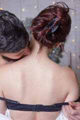 Pure passion.A man hugs and kisses a woman