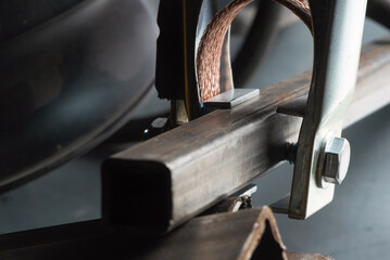 Welding clamp close up background.