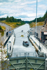 Kouvola, Finland - 5 August 2021: Kimola Canal between lakes. Gateway is open for boats going though.