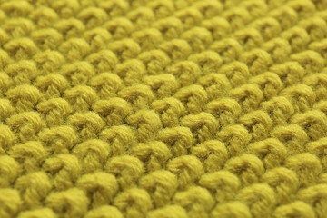 Stylish soft knitted fabric as background, closeup