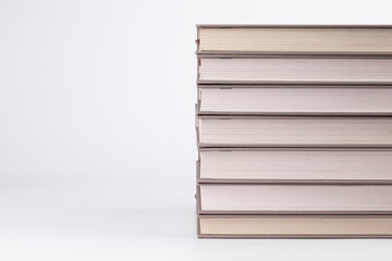 Stack of books on white background. Study, education and back to school concept. close up image.