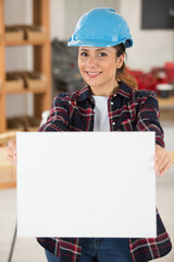 a female worker showing banner