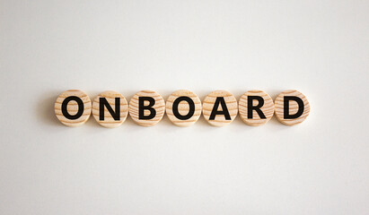 Onboard and onboarding symbol. The concept word Onboard on wooden circles. Beautiful white...