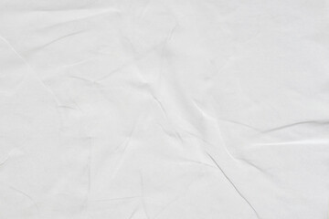 Crumpled white paper texture background.