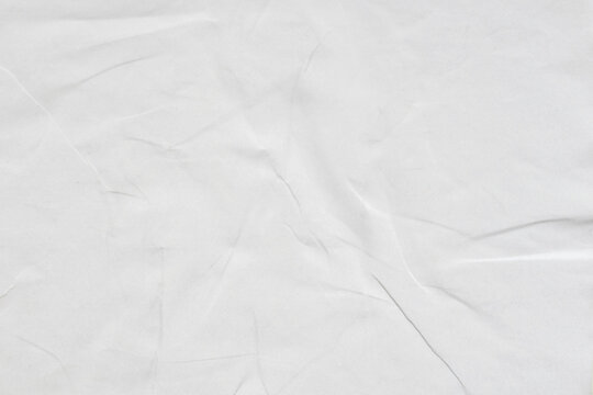 Crumpled white paper texture background.