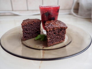 Chocolate cake with red smoothie