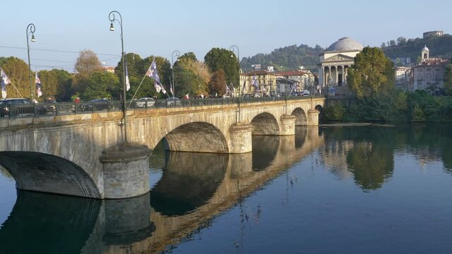 Vittorio Emanuele Bridge Across Po River In Turin, Italy With Church Of Gran Madre di Dio In Background At Daytime. wide static, 4k