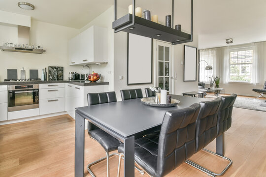Interior of stylish kitchen with dining area