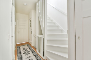 Interior of corridor with white walls and staircase